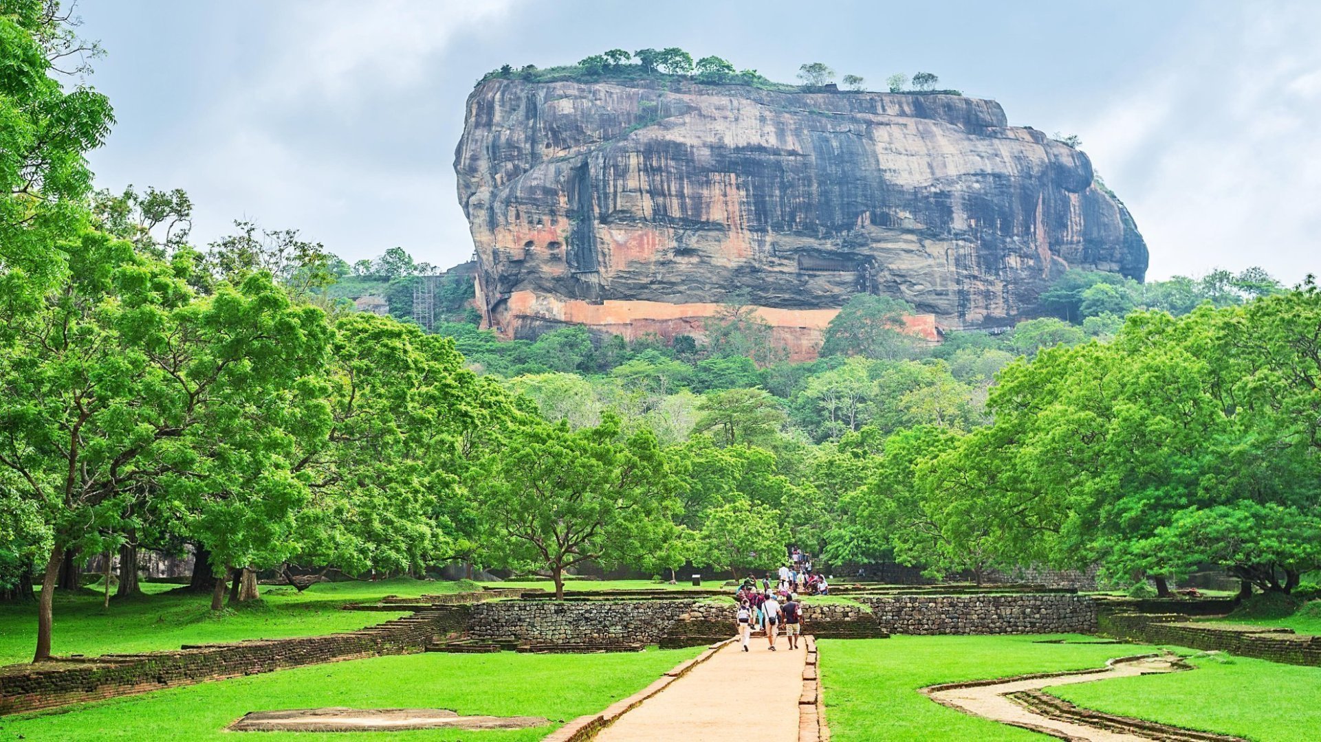 Sigiriya rock fortress surrounded by green jungle