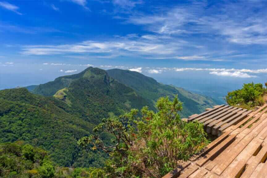 Panoramic view from World's End precipice looking out over the misty southern plains of Sri Lanka